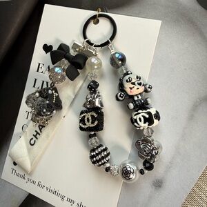 Authentic Chanel Ribbon With Skullpanda Bag Charm